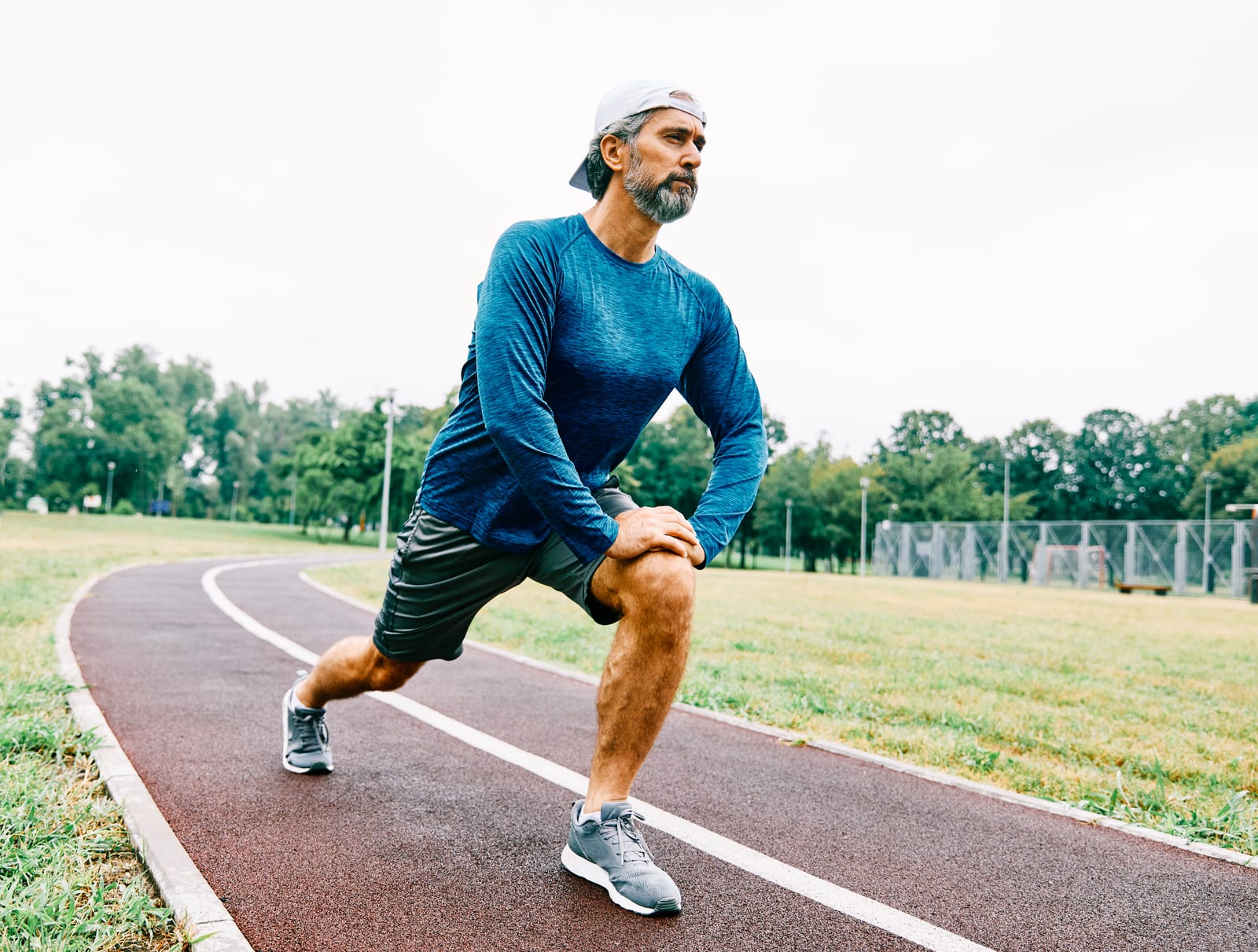 A lunge on the track before a run, the point in the day when ankle work pays off most